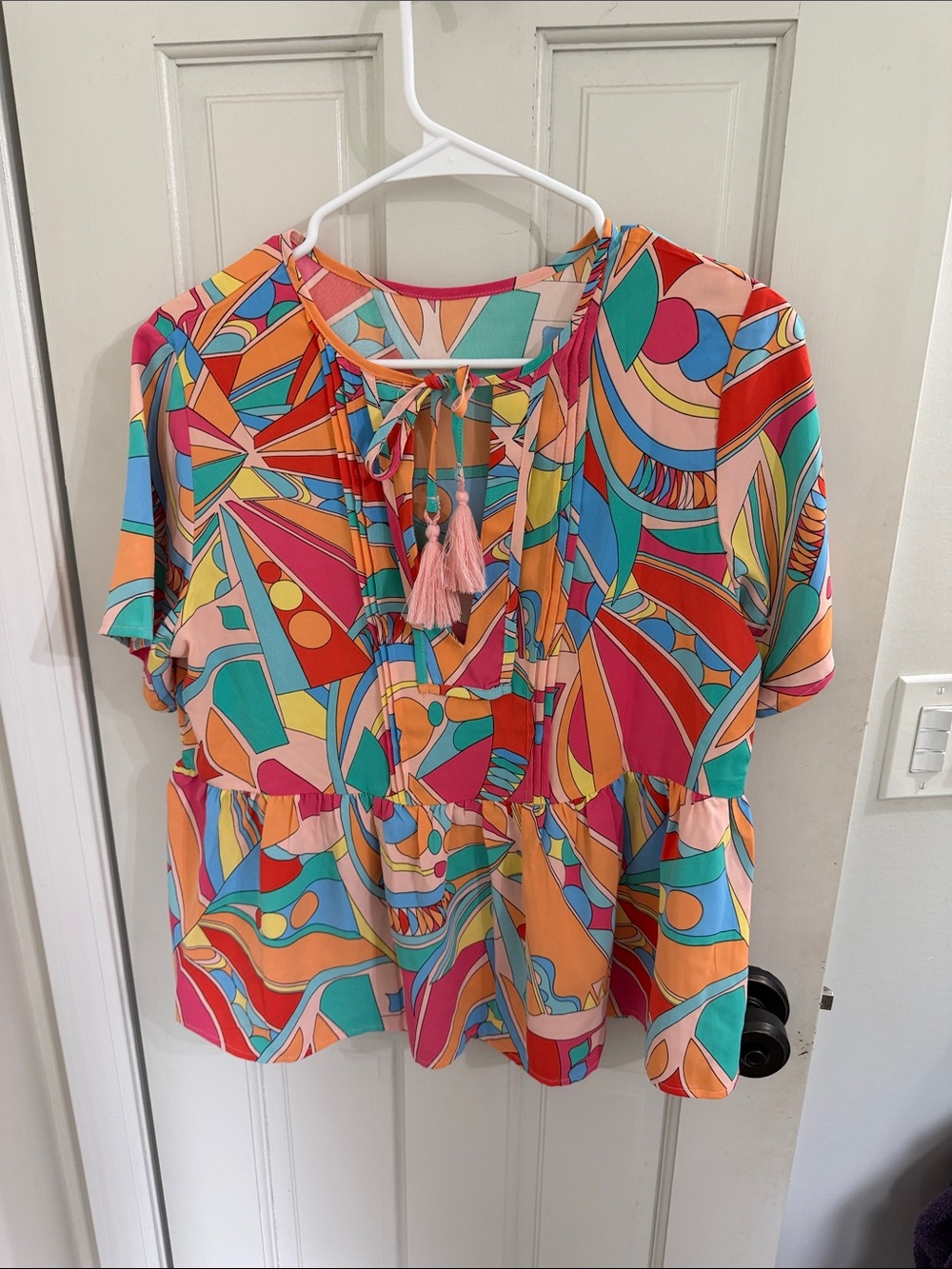 Colorful Geometric Tassel Tie Peplum Blouse - Pink/Coral Multi